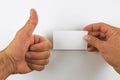 Hand hold business cards on white background