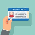 Hand hold car driver license identification photo flat design vector illustration Royalty Free Stock Photo