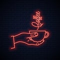 Hand hold coffee neon sign. Male coffee cup