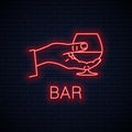 Hand hold cognac neon sign. Male brandy glass.