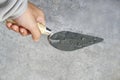Hand hold construction trowel Royalty Free Stock Photo