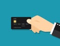 Hand hold credit card. Icon of payment. Concept of bank, money, pay. Comfort shopping without cash. Customer buy in store. Online Royalty Free Stock Photo