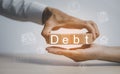 Hand hold cubes wooden blocks with the word debt on the White background, Payment of taxes and of debt to the state. Concept of fi