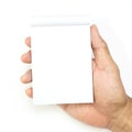 Hand hold a empty(blank) note book on white Royalty Free Stock Photo