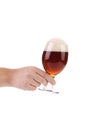 Hand hold glass of dark beer Royalty Free Stock Photo