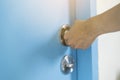 Hand hold handle of door Royalty Free Stock Photo