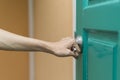 Hand hold handle of door Royalty Free Stock Photo