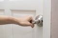 Hand hold handle of door Royalty Free Stock Photo