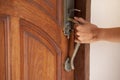 Hand hold handle of door Royalty Free Stock Photo