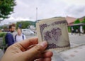 Hand hold Japanese banknotes yen-JPY