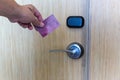 Hand Hold Key card Hotel room access. Electronic key system to lock and unlock doors