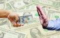 Hand hold many US Dollar with US Dollar banknote background. Royalty Free Stock Photo