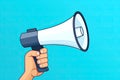 hand hold megaphone on blue background AI generated Royalty Free Stock Photo