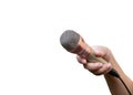Hand hold microphone on white background. interview and talking news concept. Royalty Free Stock Photo