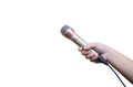 hand hold microphone on white background. interview and talking news concept. Royalty Free Stock Photo