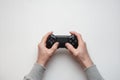 Hand hold new joystick isolated. Gamer play game with gamepad controller. Gaming man holding simulator joypad. Person with keypad Royalty Free Stock Photo