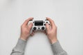 Hand hold new joystick isolated. Gamer play game with gamepad controller. Gaming man holding simulator joypad. Person with keypad Royalty Free Stock Photo