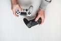 Hand hold new joystick isolated. Gamer play game with gamepad controller. Gaming man holding simulator joypad. Person with keypad Royalty Free Stock Photo