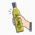 Hand hold olive oil. Male hand holding olive