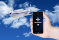 Hand hold a phone with airplane mode on the screen Royalty Free Stock Photo