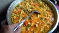 Hand hold sayur Lodeh Vegetable Soup Malaysian Dish