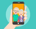 Hand hold smartphone video call with grandparent