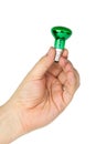 Hand hold tiny green spot tungsten Royalty Free Stock Photo