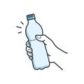 Hand hold water bottle. Male hand holding plastic Royalty Free Stock Photo