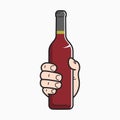 Hand hold wine bottle. Male hand holding a wine