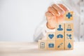 Hand hold wooden block with icon healthcare medical Royalty Free Stock Photo