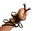Hand holdiing black network cable. Royalty Free Stock Photo