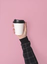 Hand holdinf coffee paper cup. mockup for creative design brand Royalty Free Stock Photo