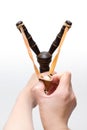 Hand Holding Aiming Slingshot