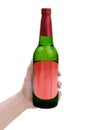 Hand holding alcoholic drink bottle Royalty Free Stock Photo