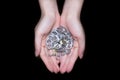 Hand holding aluminum cap Royalty Free Stock Photo