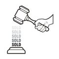 Hand holding auction hammer or gavel