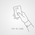 Hand holding bank card.