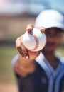 Hand holding baseball, closeup and man for sport, field and training with blurred background in sunshine. Softball