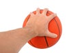 Hand holding a basketball ball isolated Royalty Free Stock Photo