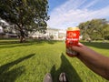 Hand holding a beer can in Vienna