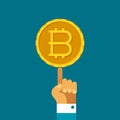 Hand holding bitcoin vector sign in flat style