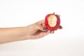 Hand holding bitten red apple isolated on white background Royalty Free Stock Photo