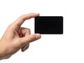 Hand holding black card isolated on white background for design purposes Royalty Free Stock Photo