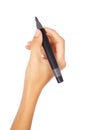 A hand holding a black marker