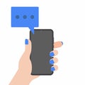 Hand holding black mobile phone with blue chat bubbles on the screen isolated on background. Royalty Free Stock Photo