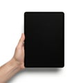 Hand holding black tablet Royalty Free Stock Photo