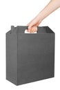 Hand holding blank black cardboard box Royalty Free Stock Photo