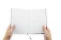 Hand holding blank book in the hand. Man show pages. Royalty Free Stock Photo