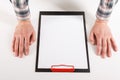 Hand holding blank clip board with white paper design mockup. Royalty Free Stock Photo