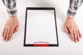 Hand holding blank clip board with white paper design mockup Royalty Free Stock Photo